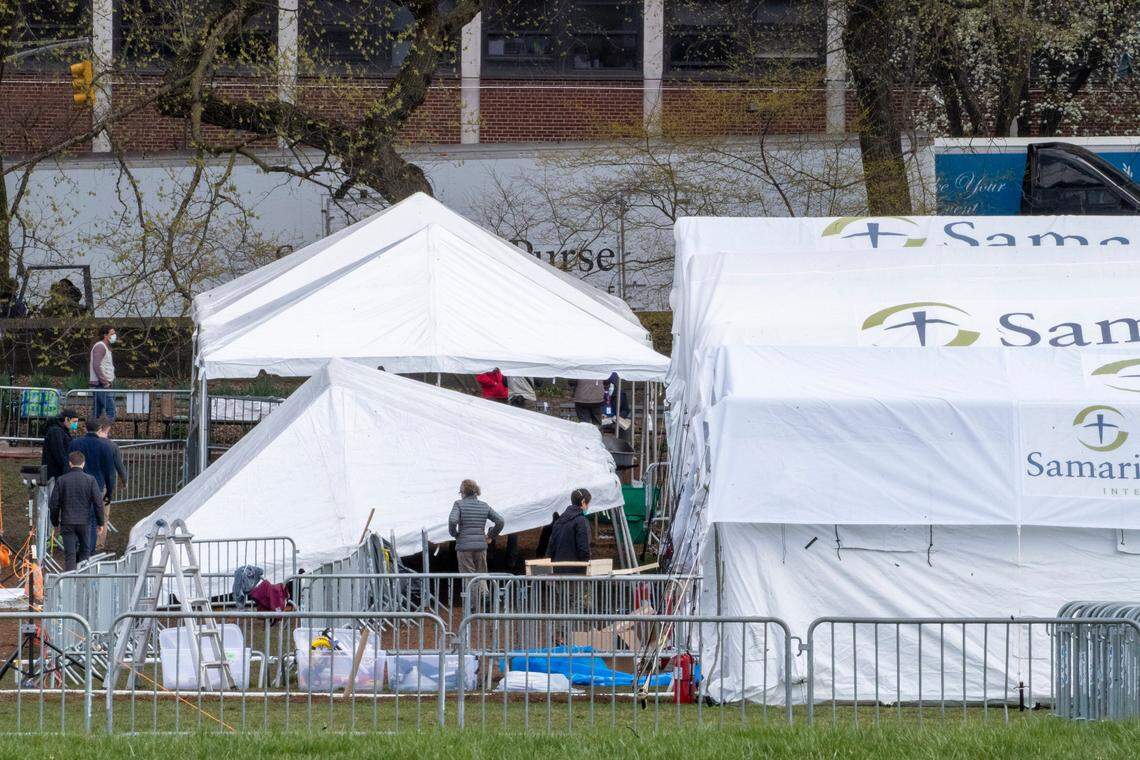 In this March 31 photo, a Samaritan’s Purse crew erects privacy tents at a 68-bed emergency field hospital specially equipped with a respiratory unit in New York’s Central Park.