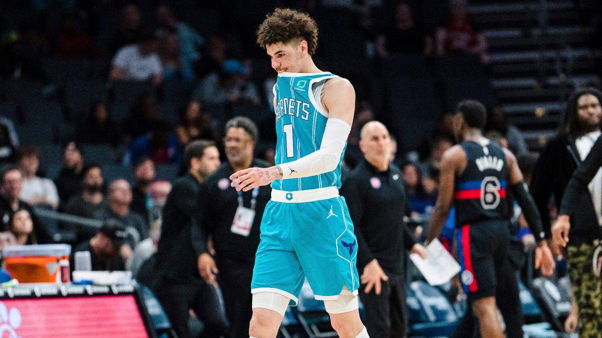 Charlotte Hornets guard LaMelo Ball walks off the court after being shaken up on a play during the second half of an NBA basketball game against the Detroit Pistons in Charlotte, N.C., Monday, Feb. 27, 2023. (AP Photo/Jacob Kupferman)
