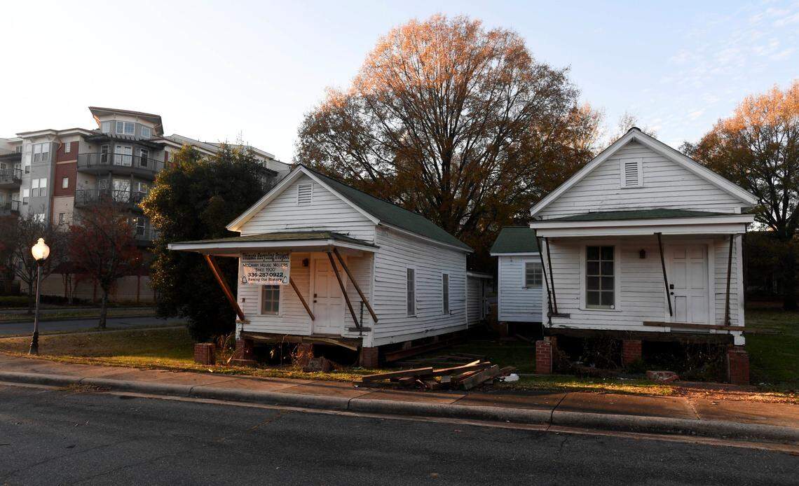 Two shotgun houses at the corner of 7th Street and N. Alexander Street in uptown Charlotte which are being moved again. On Thursday, December 10, 2020.