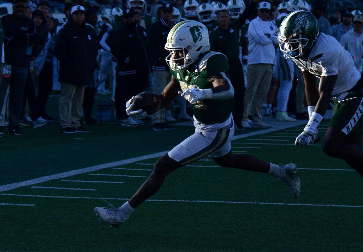 Charlotte’s #38, running back, Hahsaun Wilson races for a first half touchdown. Following a win last week against Florida Atlantic under interim coach, Tim Brewster, the Charlotte 49ers football team wrapped up their season on Senior Day at home against the UAB Blazers on Saturday, Nov. 30, 2024. Charlotte trailed UAB 14-13