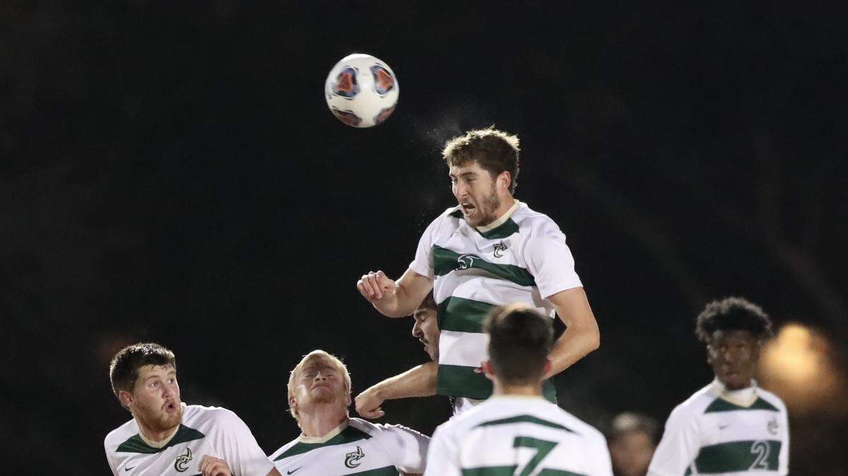 Charlottes Patrick Hogan goes up for a header during his team’s NCAA tournament game against Mercer on Thursday, November 21, 2019.