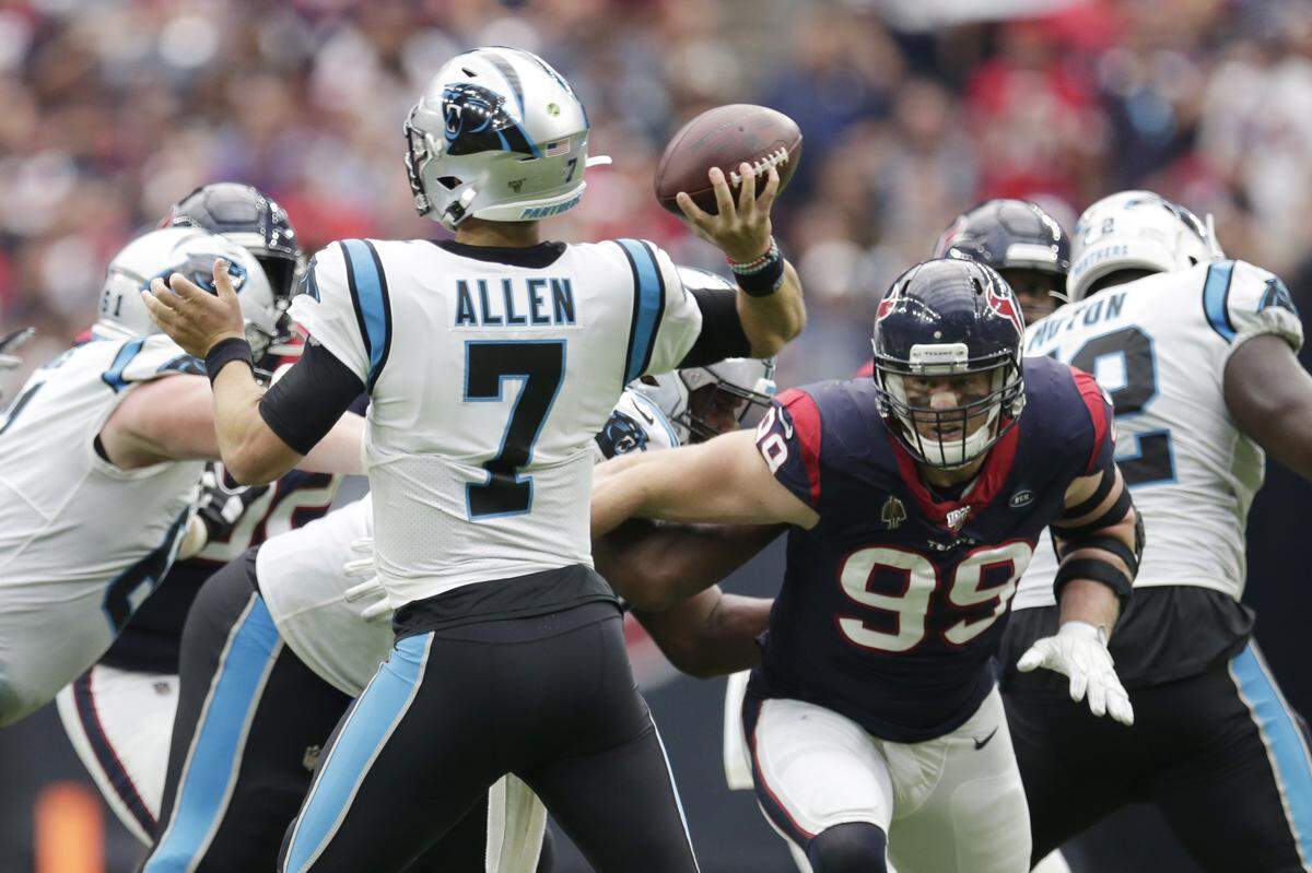 Houston Texans defensive end J.J. Watt (99) pressured Panthers quarterback Kyle Allen (7) for much of the game and strip-sacked him once to create Houston’s one offensive touchdown. But Watt couldn’t bring down Allen on a key fourth-quarter play.