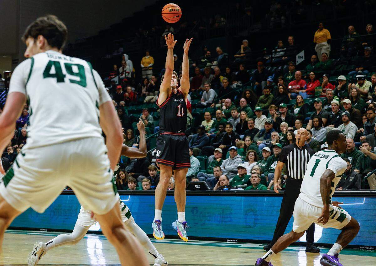 Davidson guard Hunter Adam shoots from the field during the game against UNC Charlotte at Dale F. Halton Arena on Tuesday, November 11, 2025.