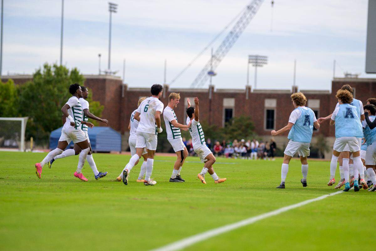 Brandon Morales celebrates after scoring what would go on to be the game winning goal in Charlotte men’s soccer’s 2-1 win over SMU in the AAC tournament championship on Nov. 12, 2023.