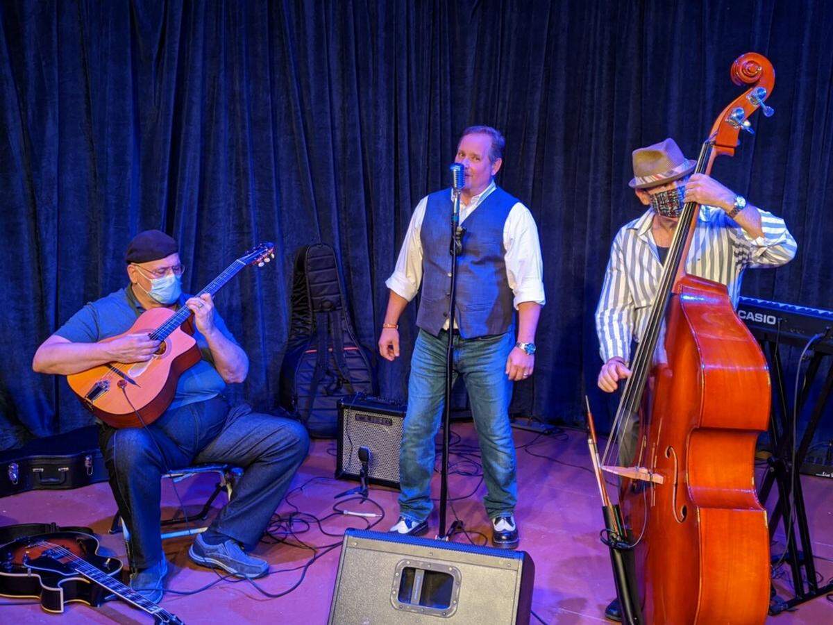 Joe Kosek and his band play on “AT’s Neighborhood,” a variety show that incorporates music, interviews with local artists and more.