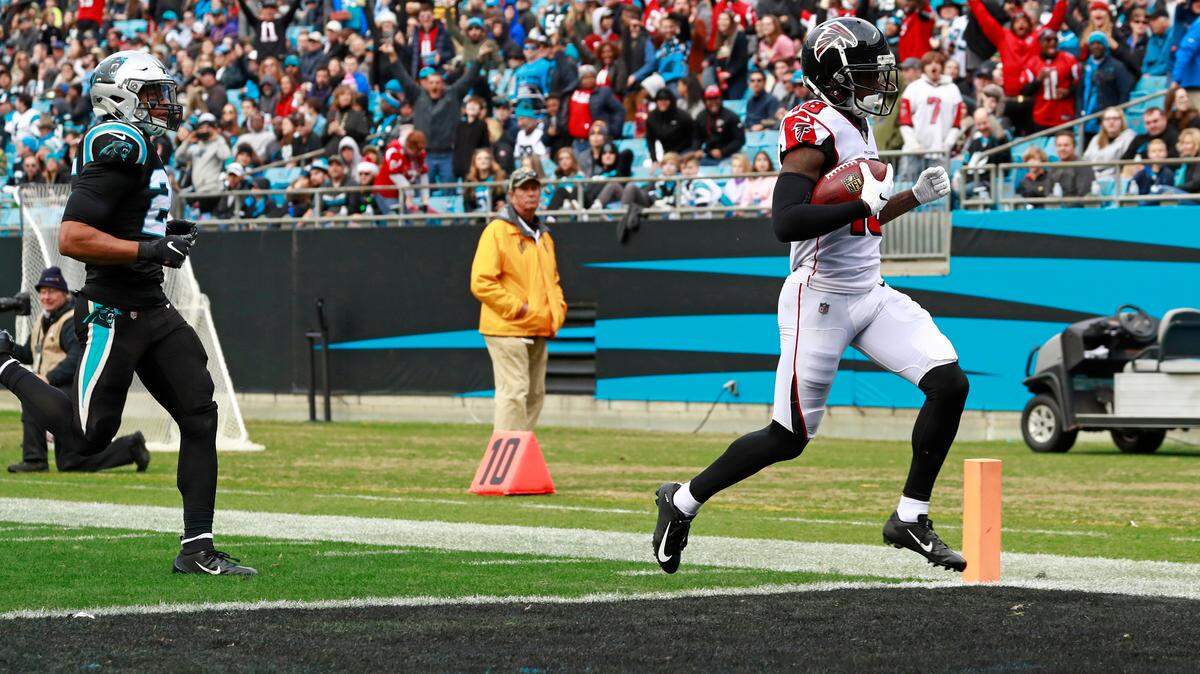 Atlanta Falcons’ Calvin Ridley (18) runs for a touchdown after a catch against the Carolina Panthers during the second half of an NFL football game in Charlotte, N.C., Sunday, Dec. 23, 2018. (AP Photo/Jason E. Miczek)