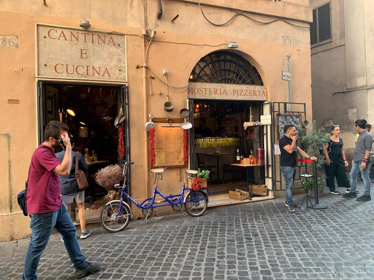 Italy requires travelers to present a negative PCR COVID-19 test and provide proof of vaccination in order to enter the country during the pandemic. Shown above is a file photo from the Parione area of Rome, near the Piazza Niavona.
