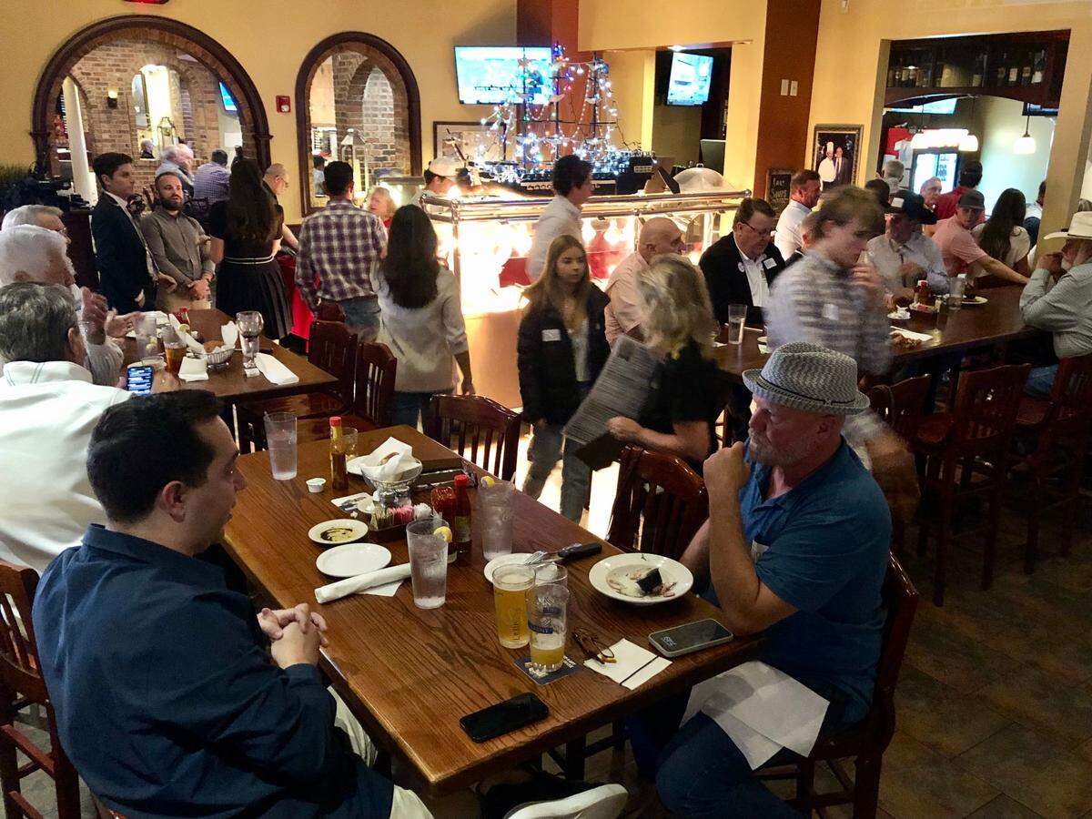 Supporters of Congressman Dan Bishop who is running for NC Attorney General gather for an election watch party at Spiro’s Hilltop Fish Fare & Steakhouse in Monroe, NC on Tuesday, November 5, 2024.