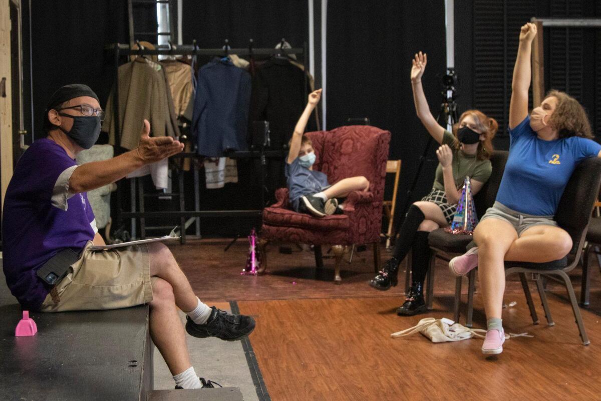 Scott Pacitti asks for suggestions from his students for the next game at the Davidson community players club on Friday, July 2, 2021. Pacitti has $50,000 to run a program that focuses on violence prevention instead of comedy.