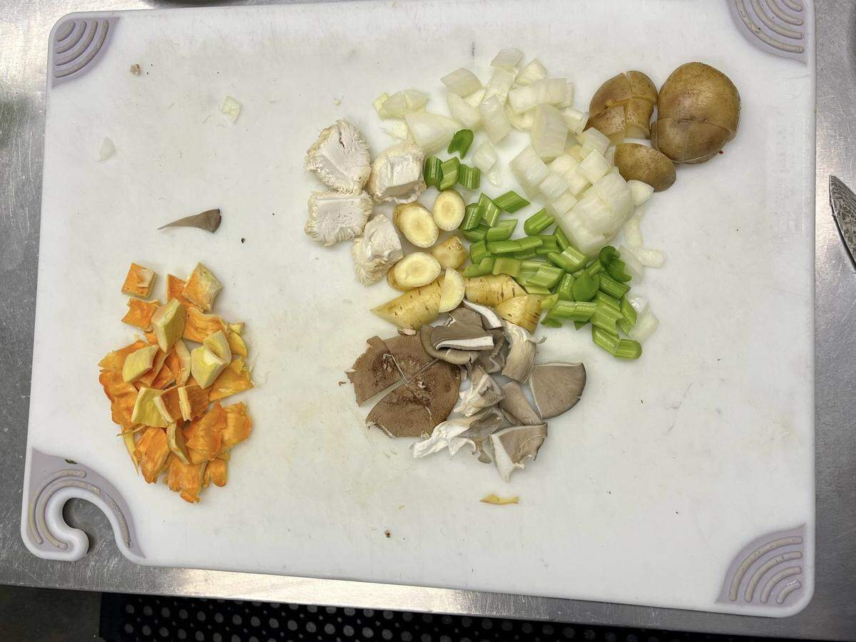 Veggies are given rustic cuts which eventually shrink in size due to simmering and reducing wine.