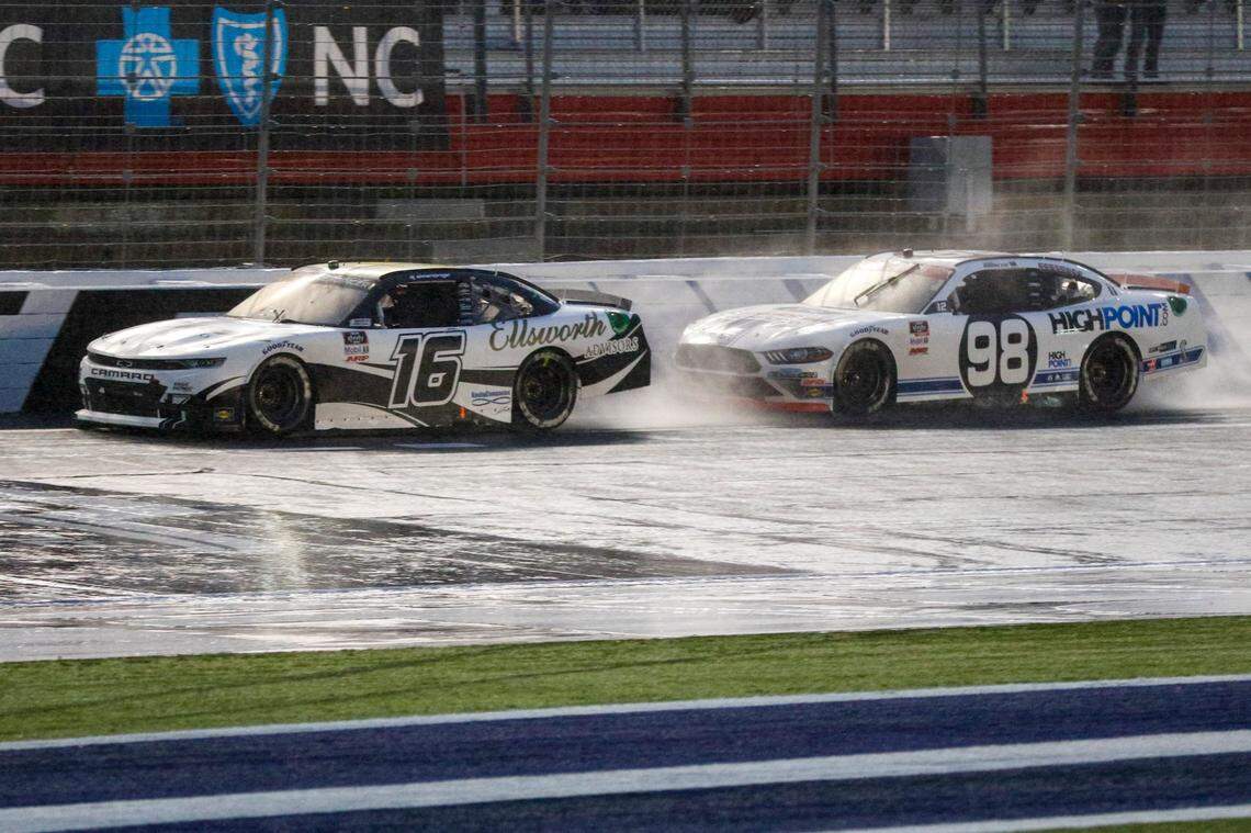 AJ Allmendinger (16) races Chase Briscoe (98) at Charlotte Motor Speedway in Concord on Saturday. Allmendinger won the race.