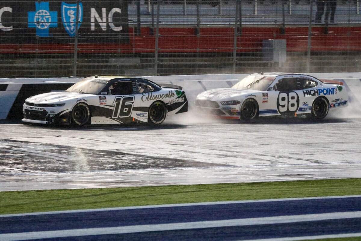 AJ Allmendinger (16) races Chase Briscoe (98) at Charlotte Motor Speedway in Concord on Saturday. Allmendinger won the race.