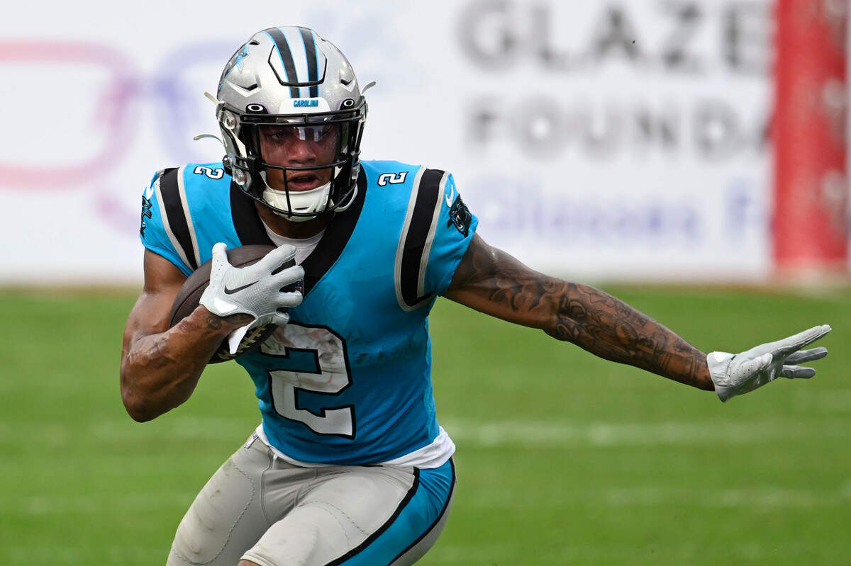 Carolina Panthers wide receiver DJ Moore runs during the second half of an NFL football game between the Carolina Panthers and the Tampa Bay Buccaneers on Sunday, Jan. 1, 2023, in Tampa, Fla. (AP Photo/Jason Behnken)