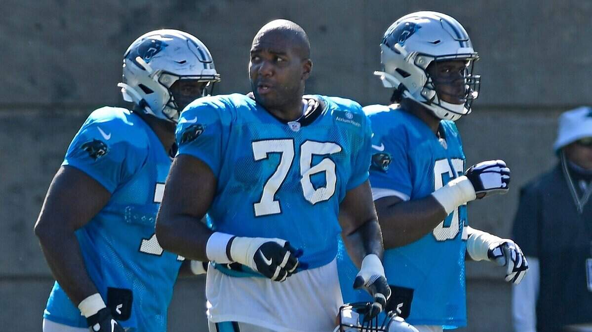 Carolina Panthers offensive tackle Russell Okung (76) prepares to huddle up during Carolina Panthers training camp on Tuesday, August 18, 2020.