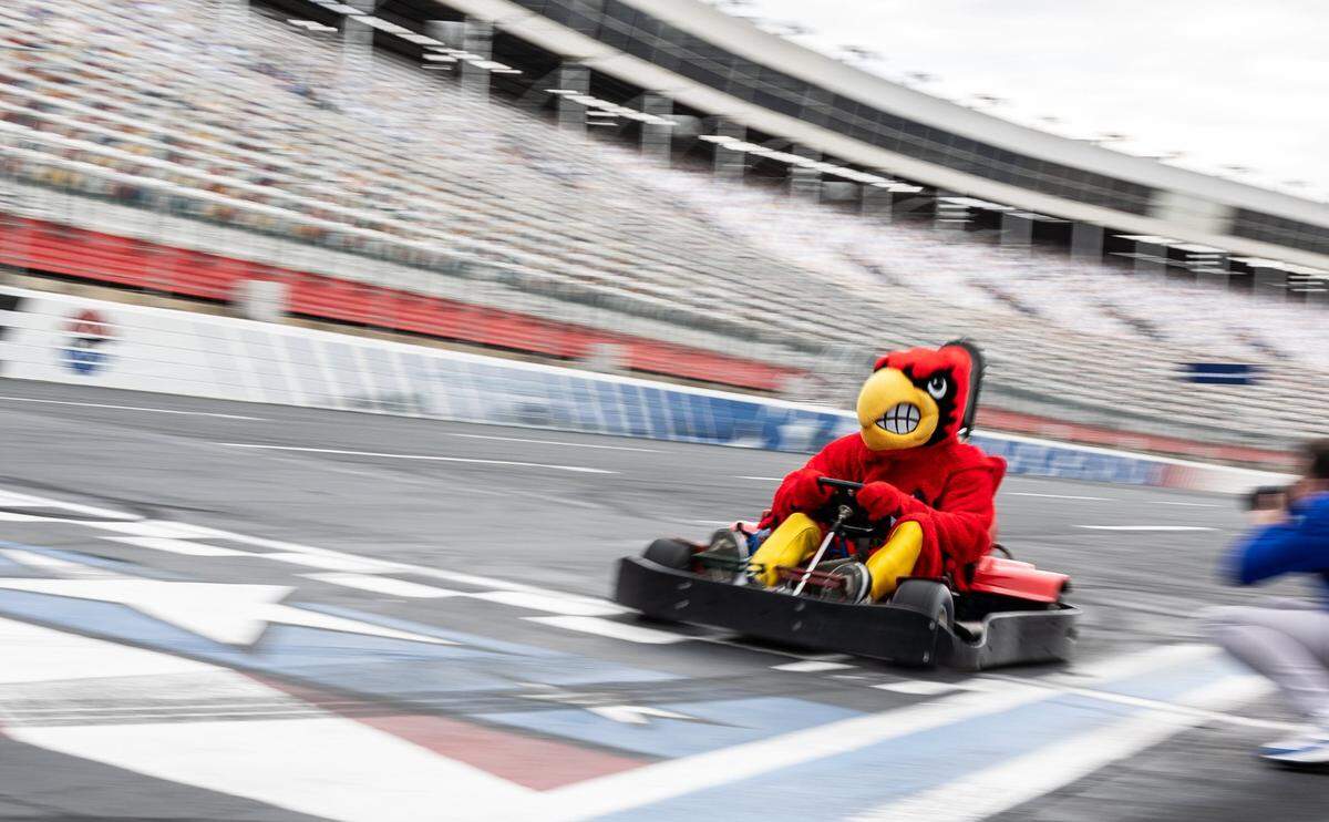 Louie the Cardinal wins the ACC mascot championship race at Charlotte Motor Speedway in Concord, N.C., on Monday, March 10, 2025. To kickoff the ACC Men’s Basketball Tournament in Charlotte, team mascots compete on the famed quarter-mile at Charlotte Motor Speedway.