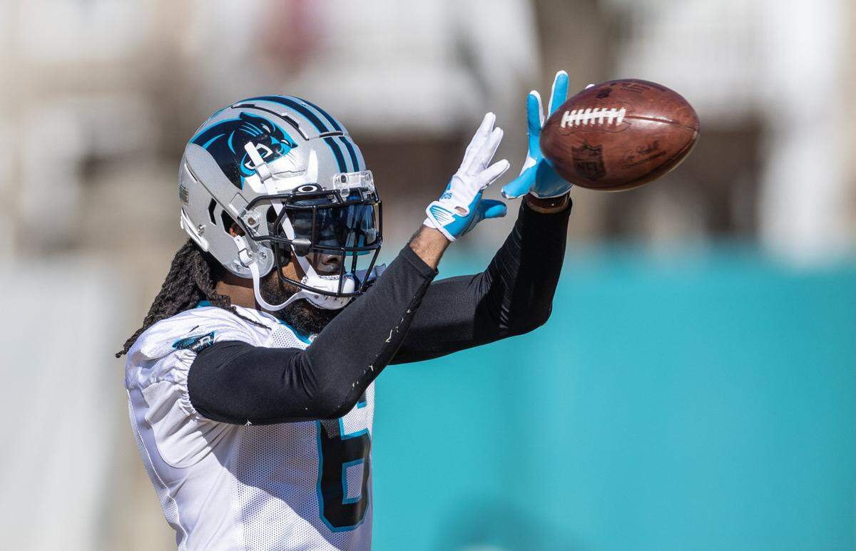 Carolina Panthers cornerback Josh Norman catches the ball during practice in Charlotte, N.C., on Wednesday, December 28, 2022. Norman, who played for the Panthers from 2012-15, rejoined the team this week.
