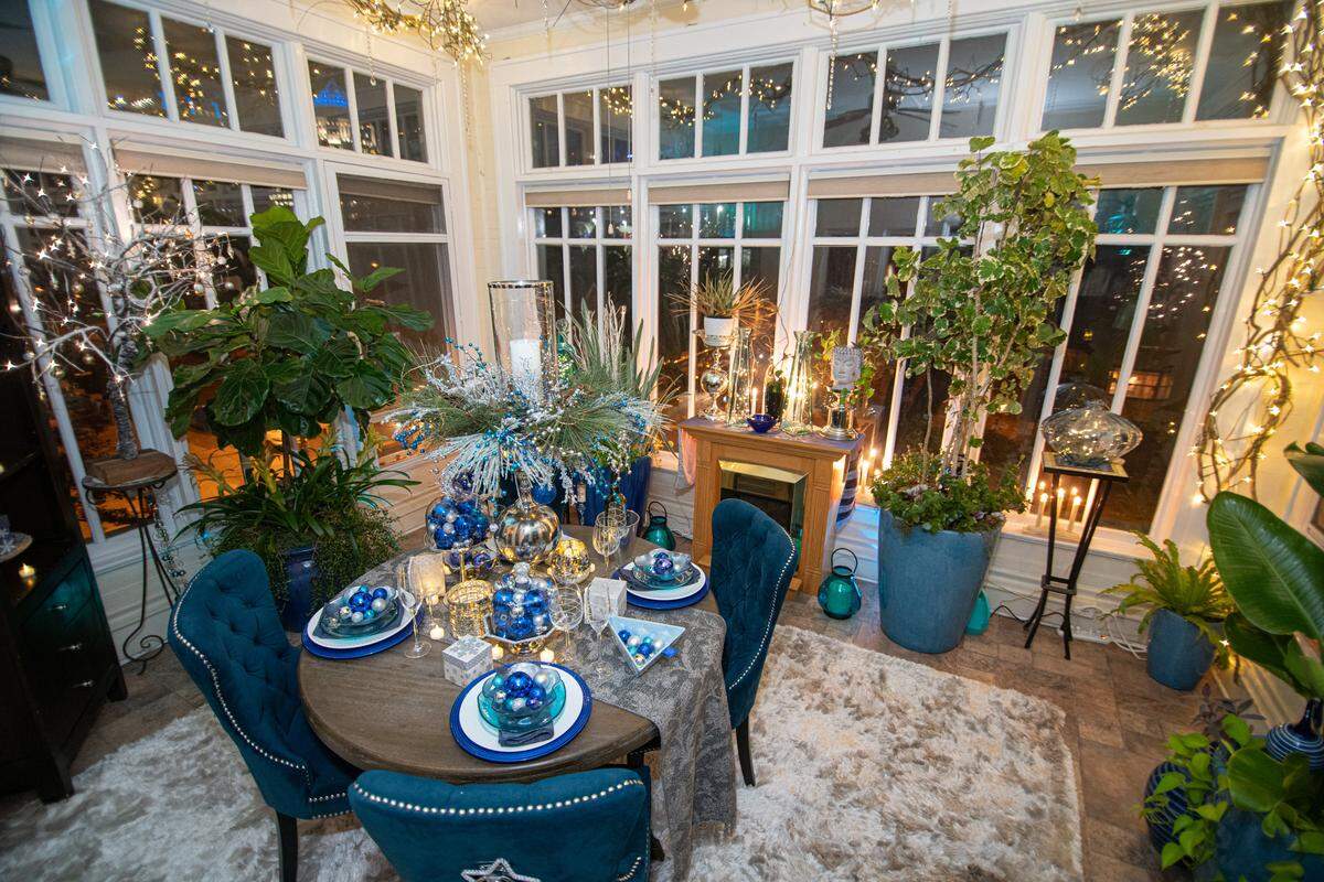 The Schaff Residence inside of St. Peter’s Condominiums features a decorated solarium — with a skyline view. 