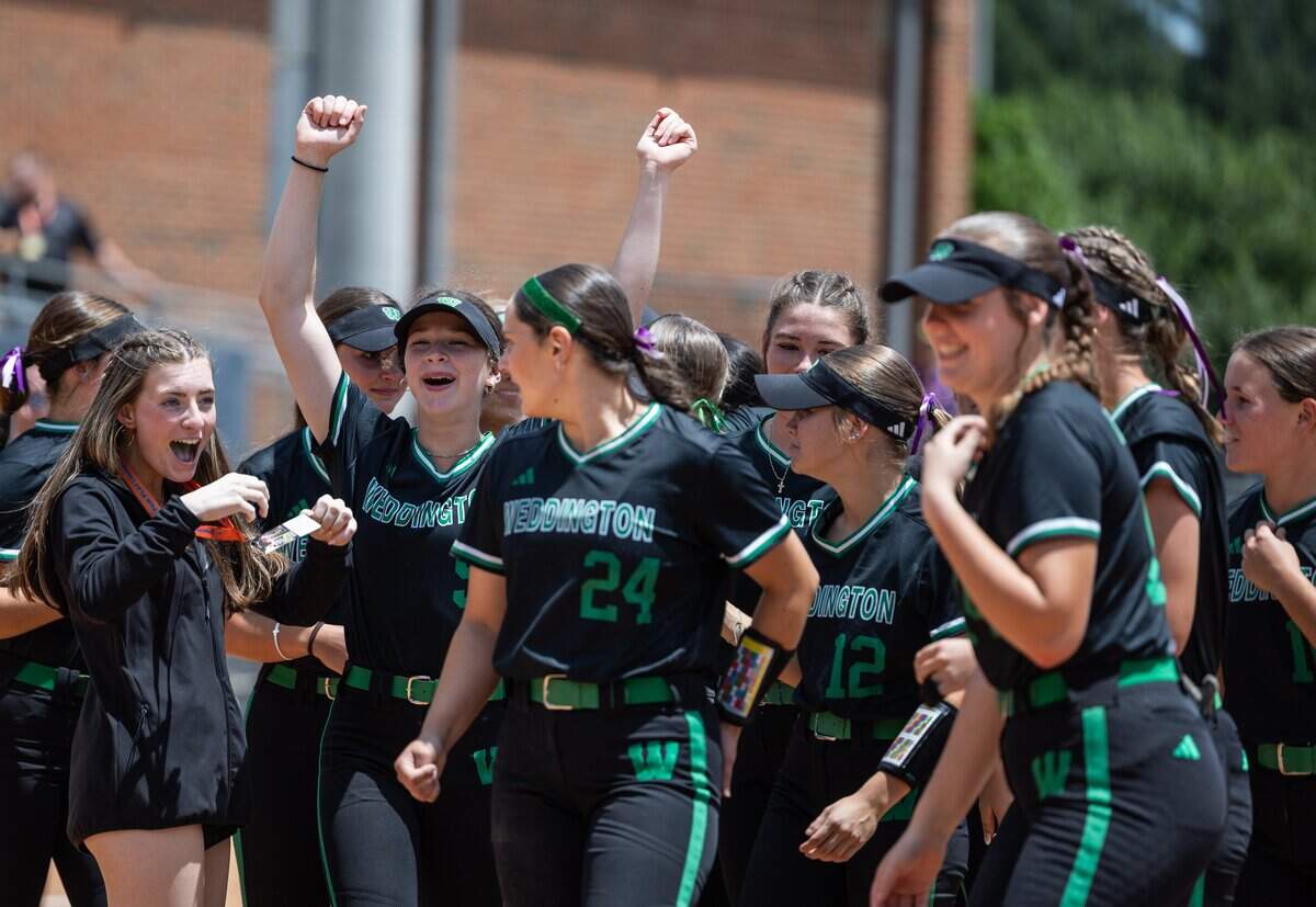 The Weddington Warriors celebrate winning the NCHSAA 7A softball championship at UNCG in Greensboro, North Carolina, on Thursday, May 28, 2026.