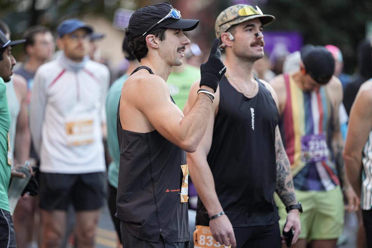 Participants prepare to compete in the Novant Health Charlotte Marathon Saturday, Nov. 15, 2025, in Charlotte, N.C.