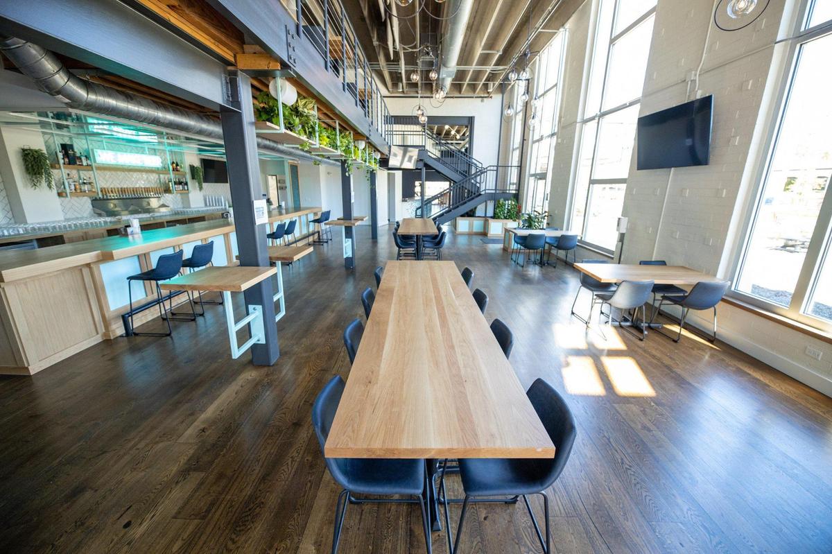 Protagonist Beer in Lower South End has a main downstairs and upstairs seating area, along with bar stools near the pizza ovens, a private room and outdoor seating.
