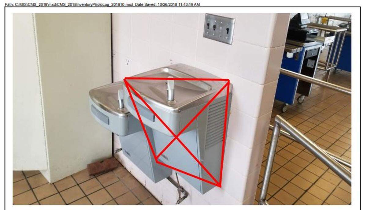 A photo from the CMS water quality report shows the cafeteria drinking fountain at Garinger High that tested at 658 parts per billion of lead in the water. The red lines, which are part of the report, indicate that the fountain at right did not test high.