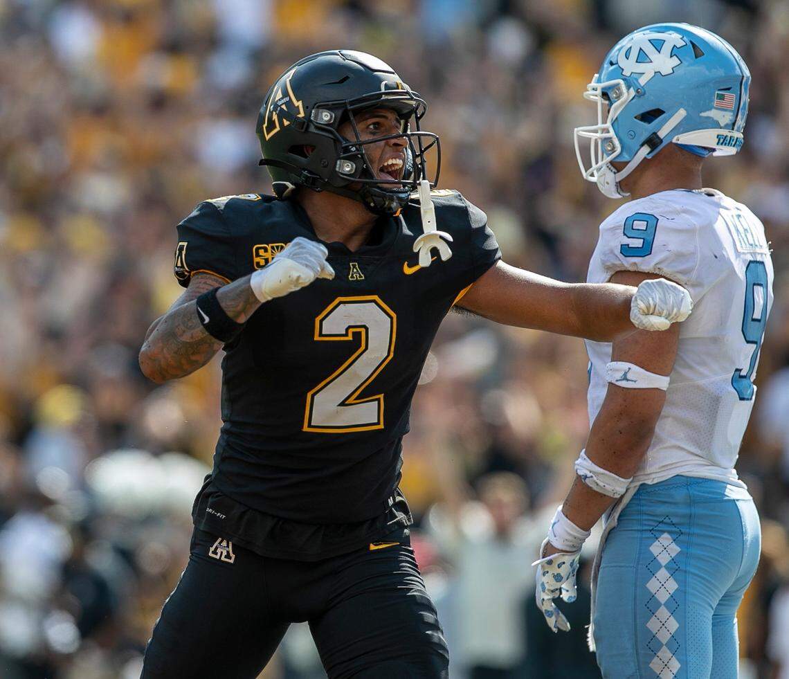 Appalachian State’s Kaedin Robinson (2) reacts after scoring a touchdown on a 26-yard pass from quarterback Chase Brice with :09 seconds to play in the game on Saturday, September 3, 2022 at Kidd Brewer Stadium in Boone, N.C.