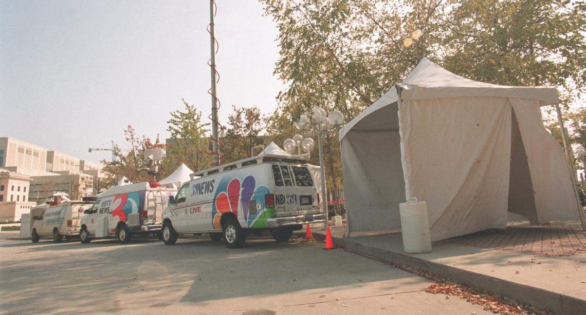 Media trucks and tents await the start of the Rae Carruth trial in front of the Mecklenburg Criminal Courts Building. National media also swarmed Charlotte for coverage of the trial in which Carruth, a former Carolina Panther, was charged with first-degree murder in the death of Cherica Adams.