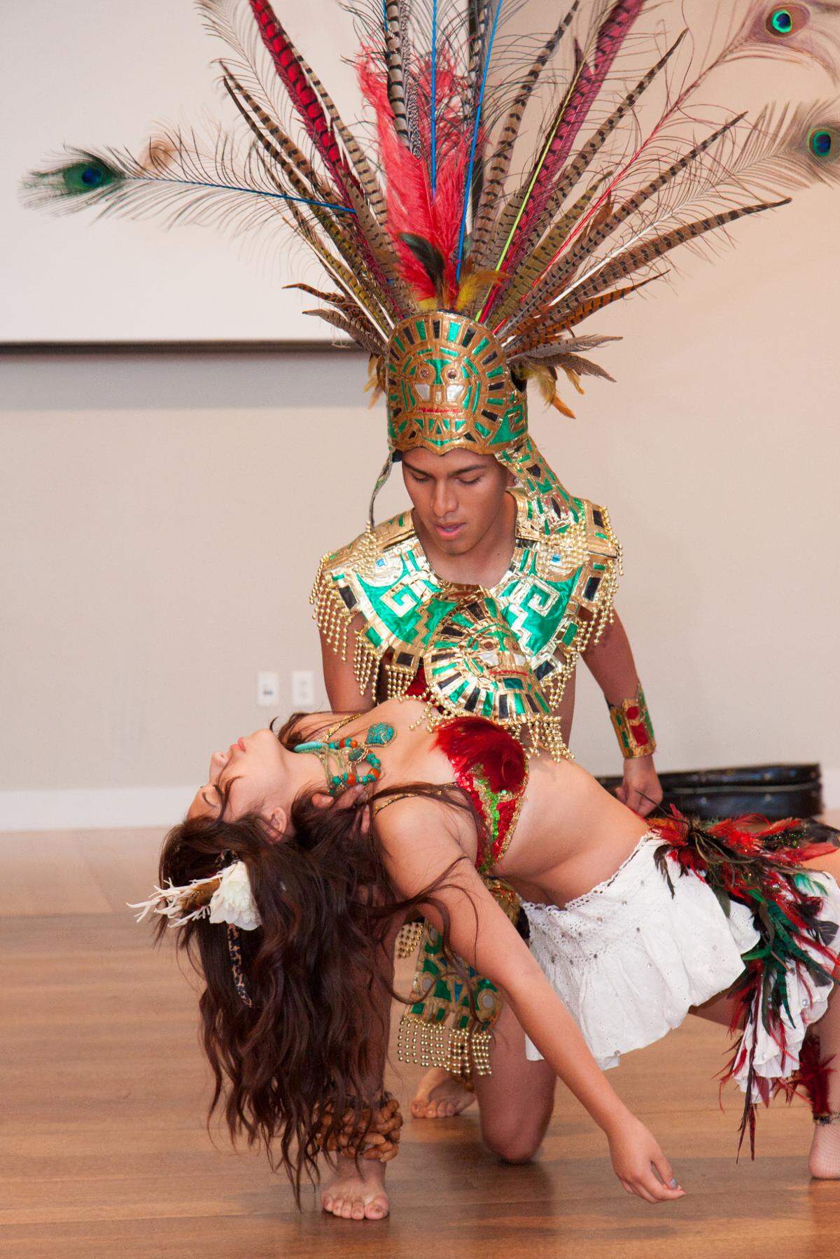 Brenda Alexandra Leon and David Campuzano of El Alma de la Luna Dance Academy perform at a Con A de Arte event at The Mint Museum.
