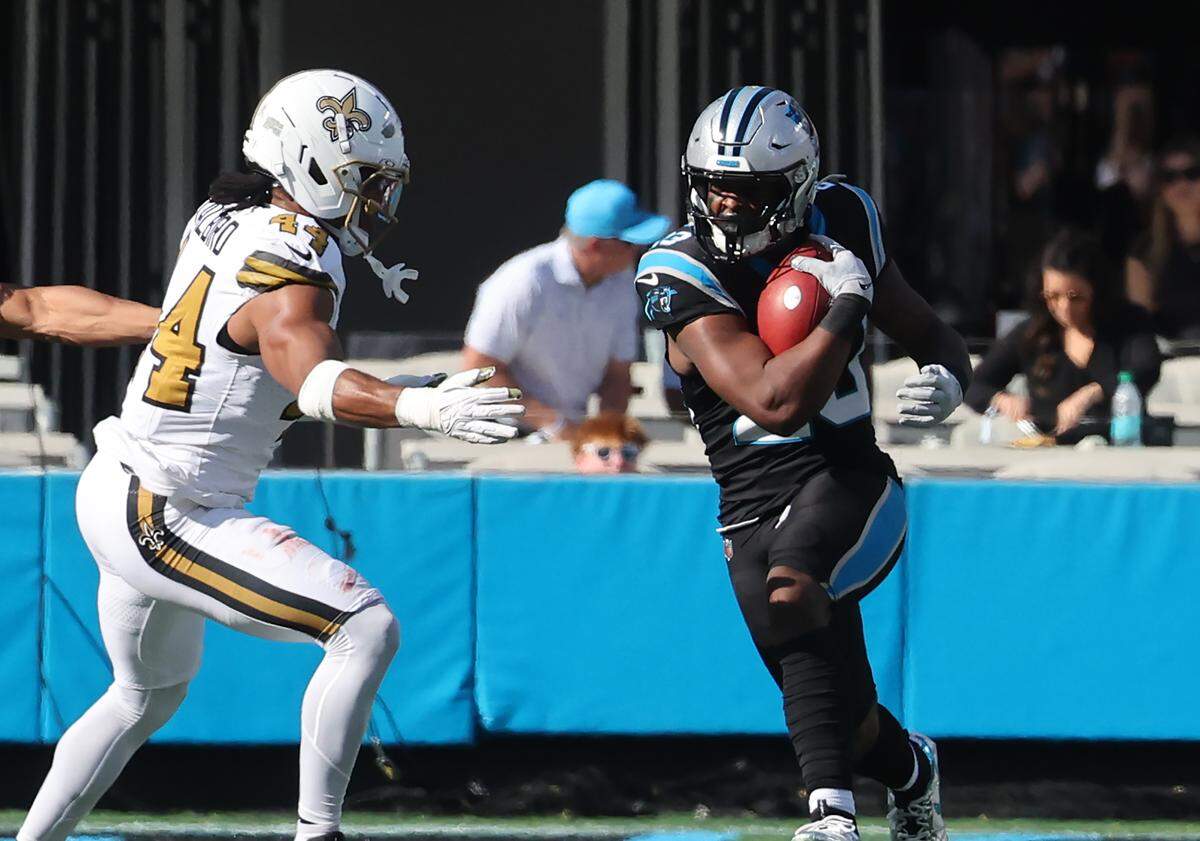 Carolina Panthers running back Trevor Etienne carries the ball on Sunday, Nov. 9, 2025 in Charlotte.