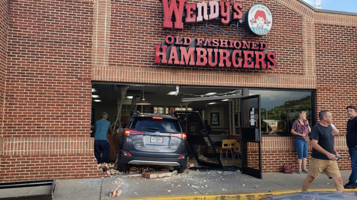 Sheriff Lee Foster, from Newberry County, South Carolina, said an evacuee of Hurricane Florence from Myrtle Beach was pinned under an SUV after the driver, also an evacuee, slammed into a Wendy’s.