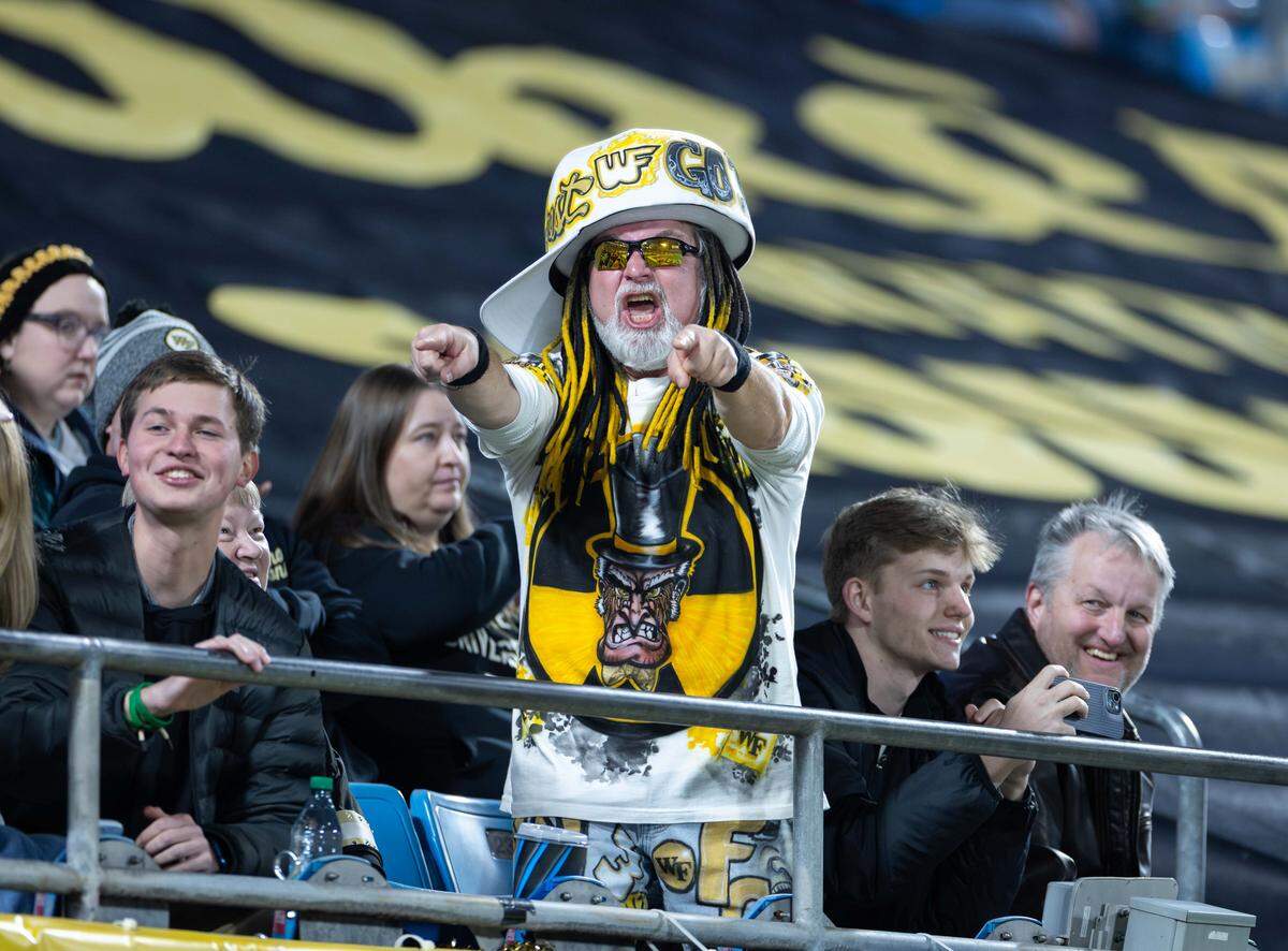 A Wake Forest Fan celebrates Kordell Bartley's touchdown. Wake Forest would play Mississippi State in the Duke’s Mayo Bowl at Bank of America Stadium on Friday, January 2, 2026.