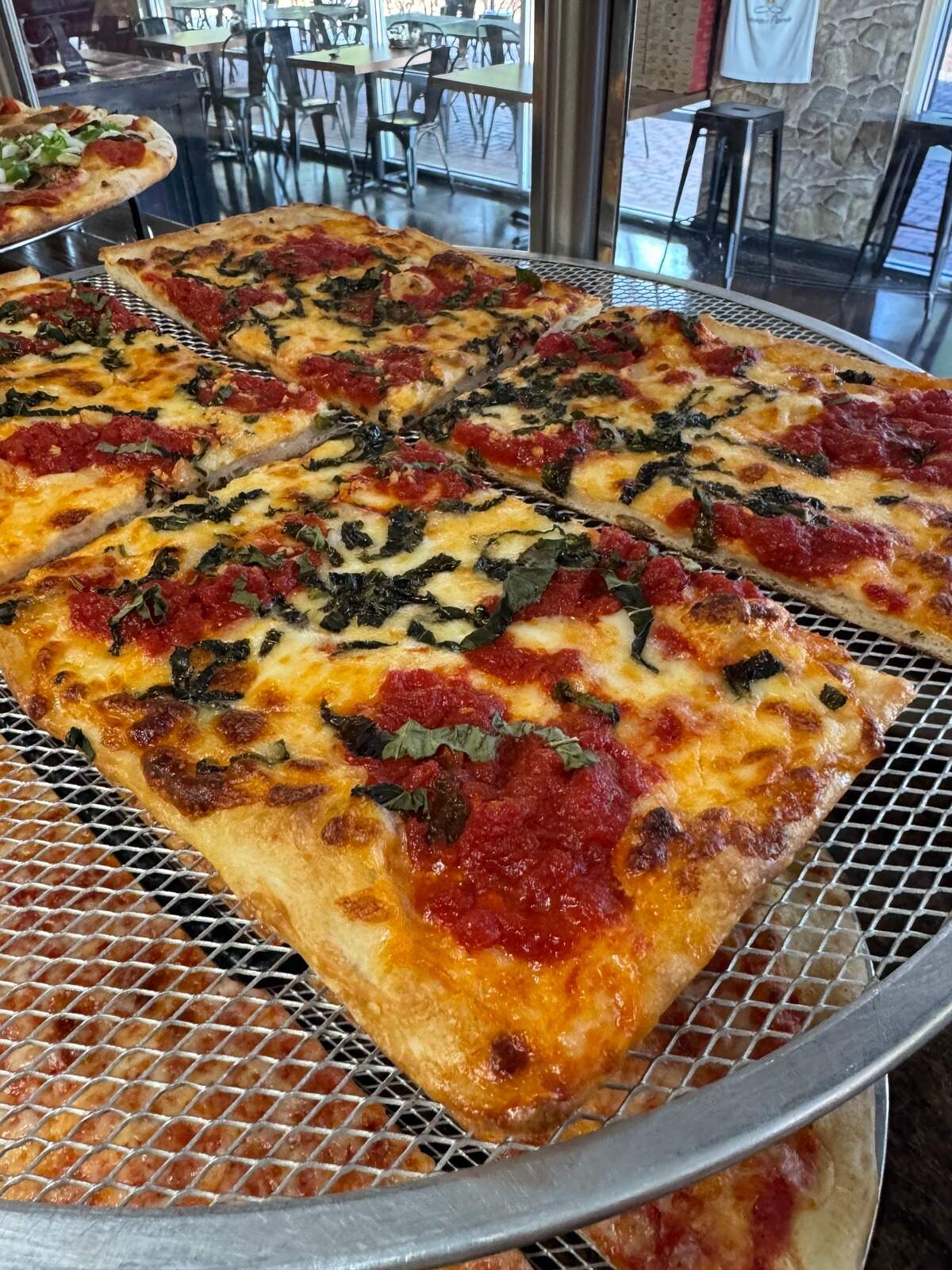 Margherita pie with fresh mozzarella and fresh basil at Lorenzo’s Pizzeria in Charlotte.