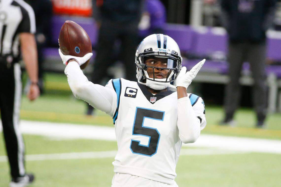 Carolina Panthers quarterback Teddy Bridgewater (5) warms up before an NFL football game against the Minnesota Vikings, Sunday, Nov. 29, 2020, in Minneapolis. (AP Photo/Bruce Kluckhohn)