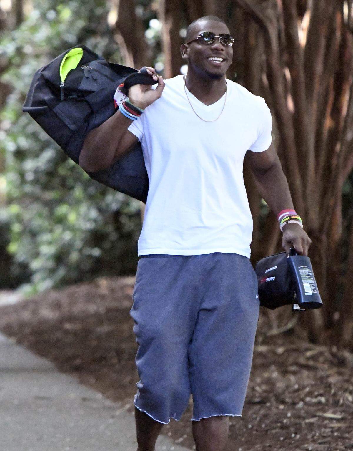 Carolina Panthers wide receiver Devin Funchess (17) smiles as arrives to the dorm for training camp at Wofford College on Wednesday, July 25, 2018.