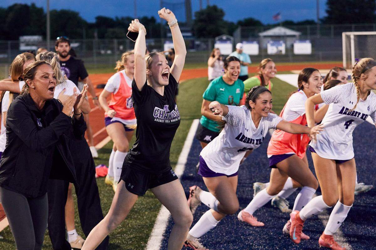 Ardrey Kell players jump off the bench in pure bliss as they celebrate making the NCHSAA 4A Semi-Finals.