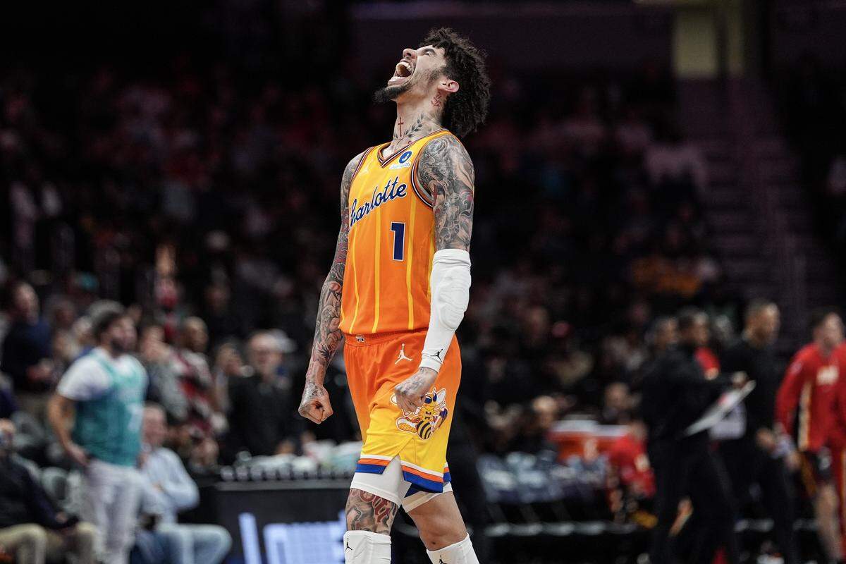 Charlotte Hornets guard Lamelo Ball (1) reacts during the second half of an NBA basketball game against the Atlanta Hawks, Thursday, Dec. 18, 2025, in Charlotte, N.C.