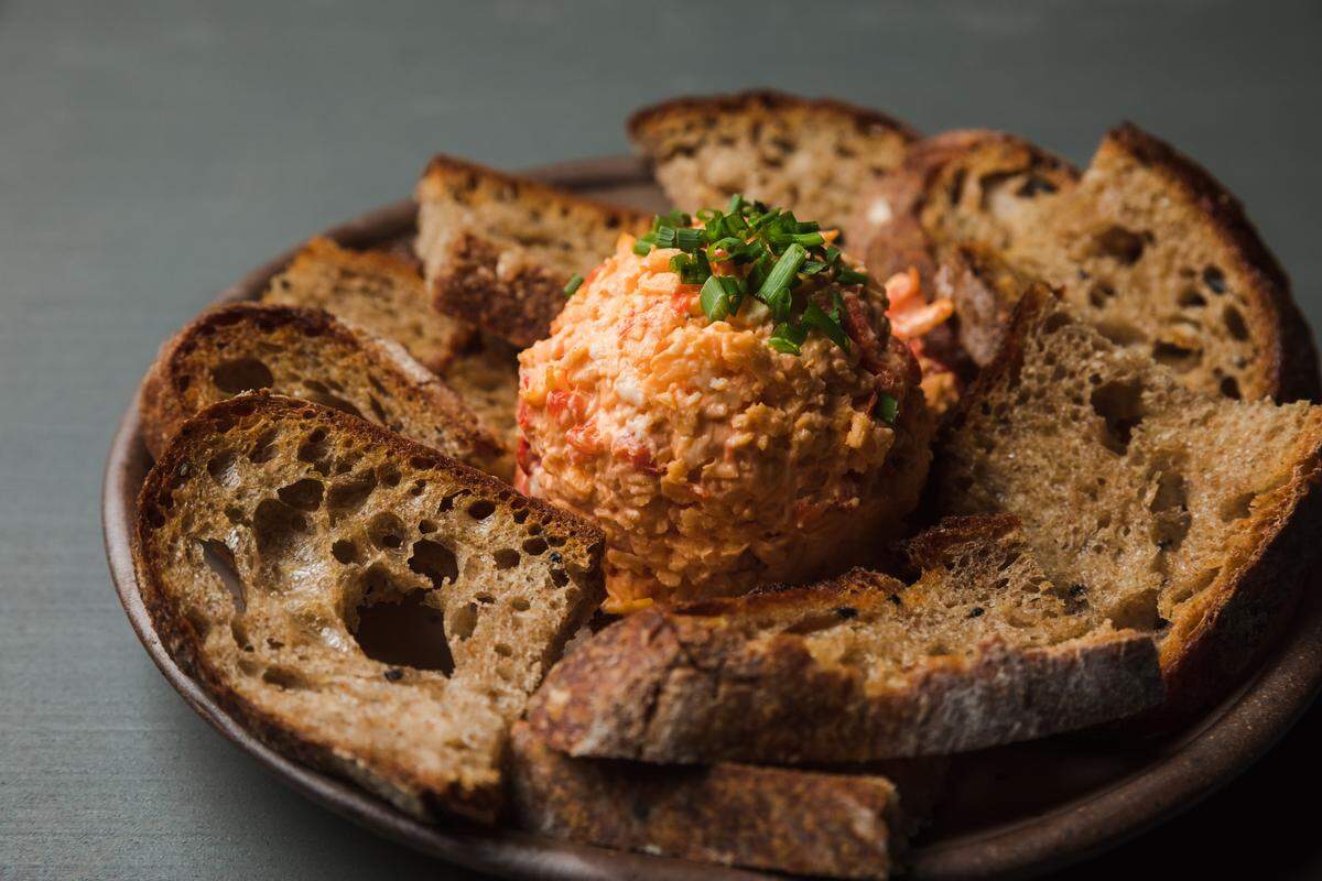 Plan to enjoy a meal at The King’s Kitchen, which recently reopened in uptown.