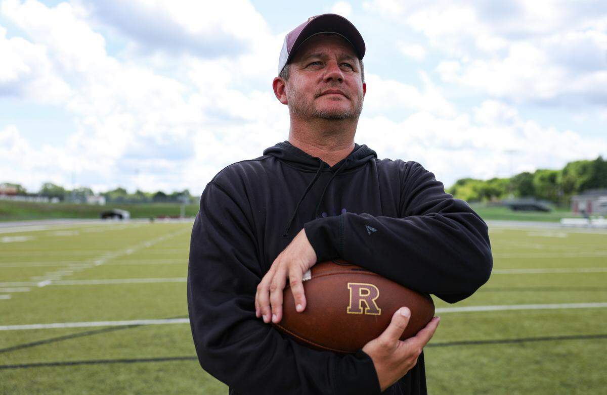 Jay M. Robinson head football coach Jason Siedel poses for a portrait after practice in Concord, NC on Tuesday, July 23, 2024.