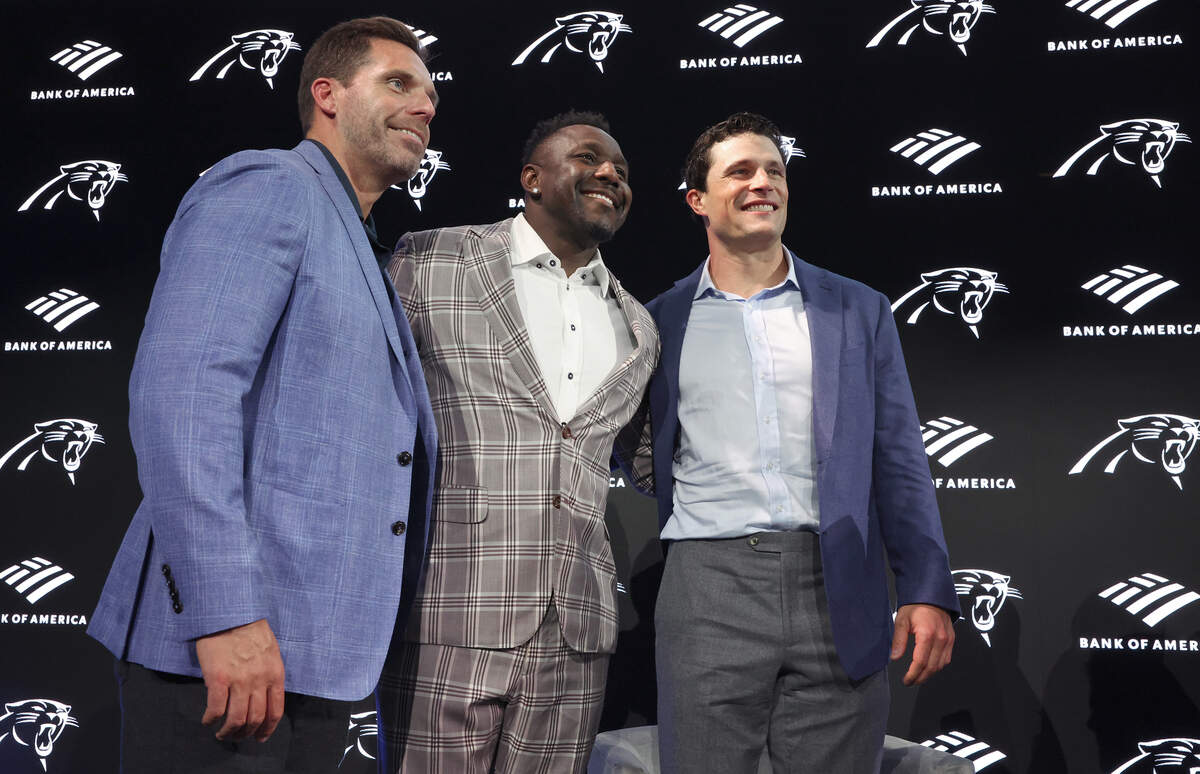 Former Carolina Panthers linebackers Dan Morgan, Thomas Davis and Luke Kuechly pose together following a fireside chat on Thursday, July 23, 2026.