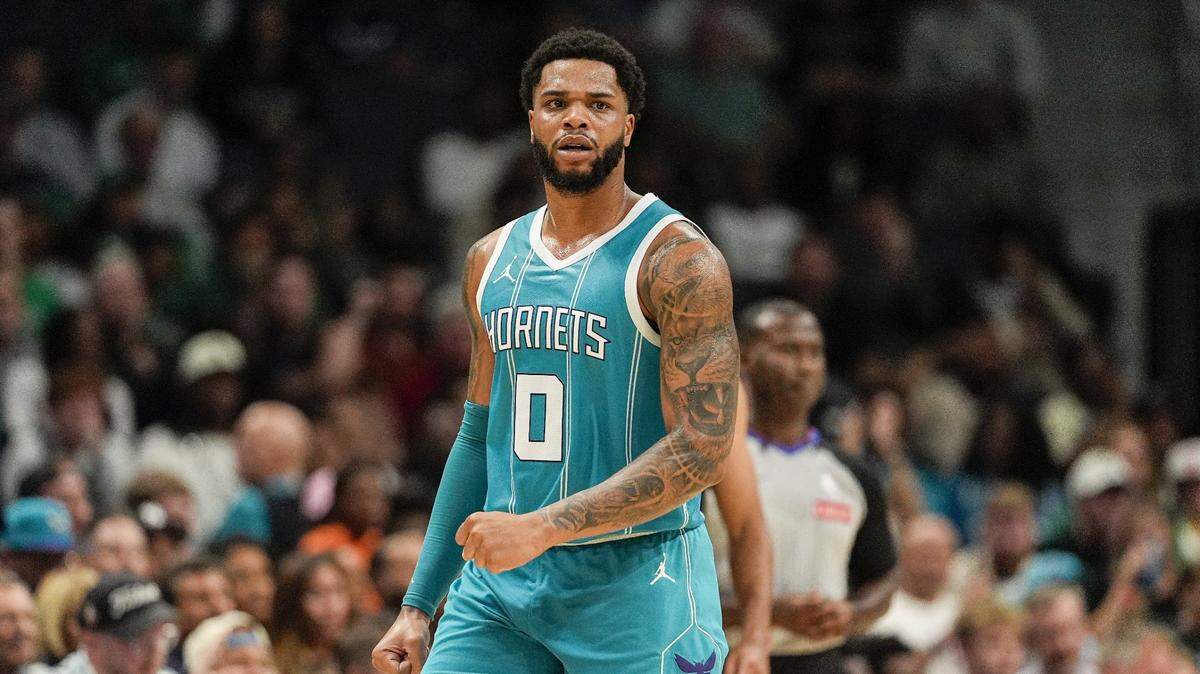 Charlotte Hornets forward Miles Bridges (0) reacts to a three point shot against the Boston Celtics during the second half at the Spectrum Center.
