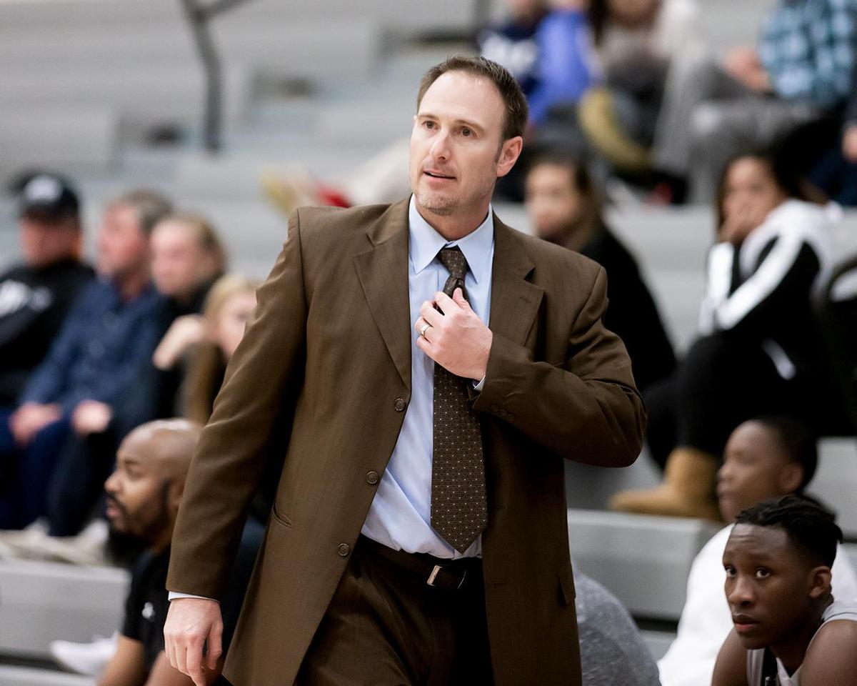 Hough Huskie Head Coach Jason Grube calls a timeout late in the second quarter of Tuesday’s tough loss at Ardrey Kell. .