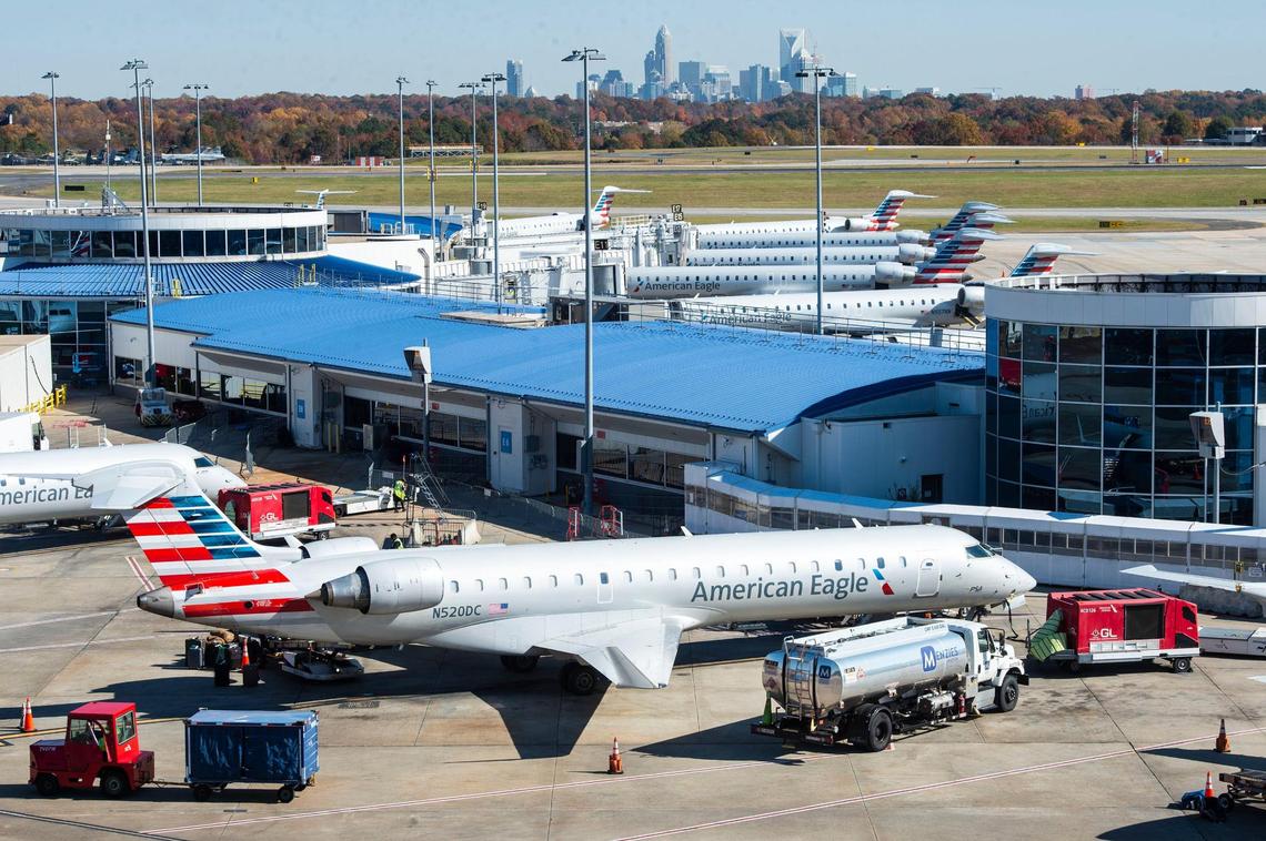 American Airlines planes sit at terminals at Charlotte Douglas International Airport on Tuesday, November 16, 2021 in Charlotte, NC.
