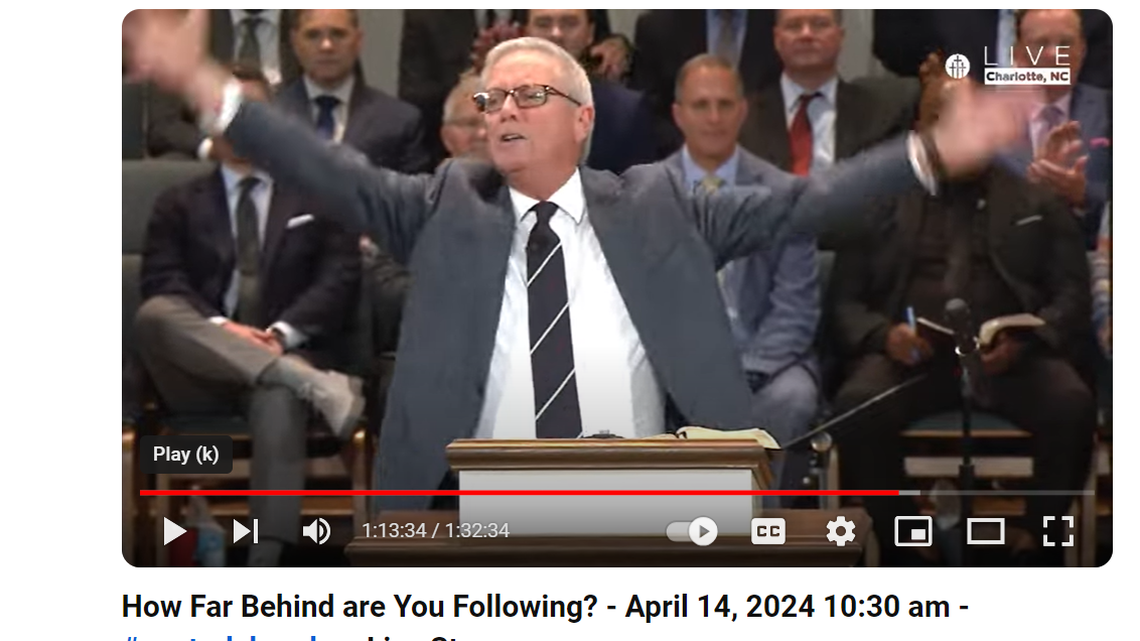 Rev. Loran Livingston, the senior pastor of Central Church in Charlotte, is shown delivering a sermon on April 14, 2024, as he denounces the Trump Bible.