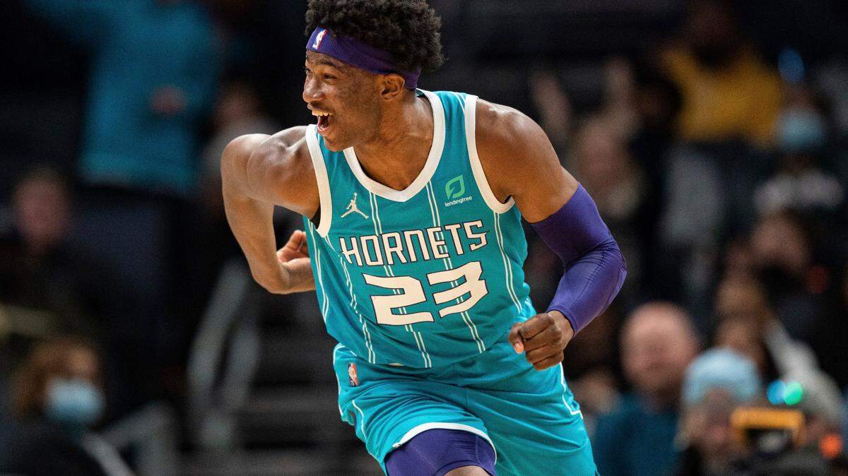 Charlotte Hornets forward Kai Jones (23) reacts after dunking the ball against the Minnesota Timberwolves during the second half of an NBA basketball game in Charlotte, N.C., Friday, Nov. 26, 2021. (AP Photo/Jacob Kupferman)