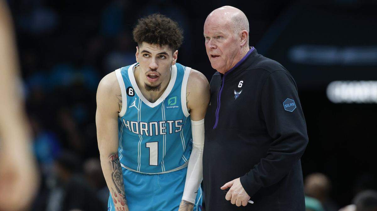 Feb 15, 2023; Charlotte, North Carolina, USA; Charlotte Hornets head coach Steve Clifford, right, talks to guard LaMelo Ball (1) during the second half against the San Antonio Spurs at Spectrum Center. The Charlotte Hornets won 120-110. Mandatory Credit: Nell Redmond-USA TODAY Sports