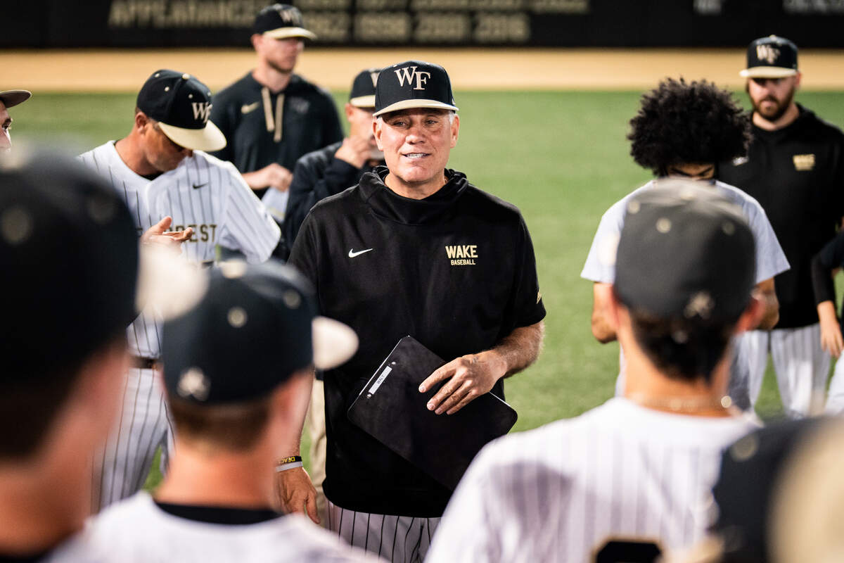 Wake Forest baseball coach Tom Walter gathers his team last month during his team’s historic, 50-win season. The Demon Deacons will host their Super Regional series this weekend against Alabama, which begins at noon Saturday, June 10, 2023.
