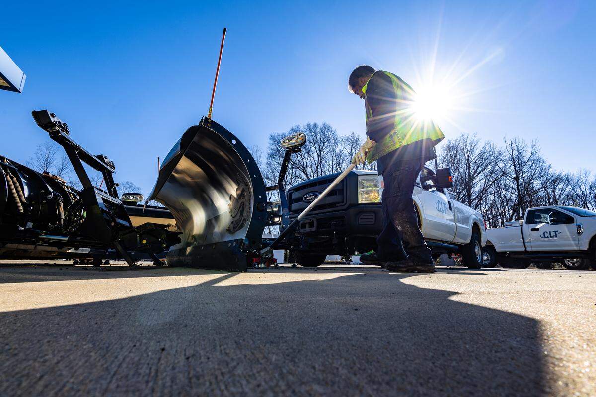 Snow crews at Charlotte Douglas International Airport prepare for Winter Storm Fern.