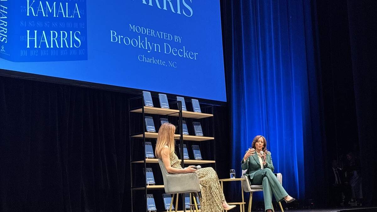 Former Vice President Kamala Harris speaks at the Ovens Auditorium in east Charlotte on Tuesday as part of the book tour for her campaign memoir, “107 Days.” The Charlotte stop was moderated by actress and model Brooklyn Decker.