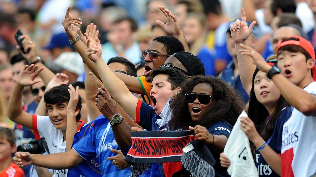 Paris Saint-Germain fans cheer on their team vs Chelsa in the International Champions Cup soccer match at Bank of America Stadium in 2015. After missing last year, international soccer will return to the city this summer.