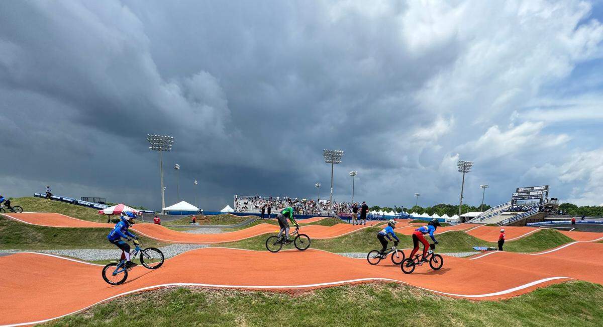 Large storm clouds blanket Rock Hill as BMX racers practice Friday at the Rock Hill BMX Supercross Track.